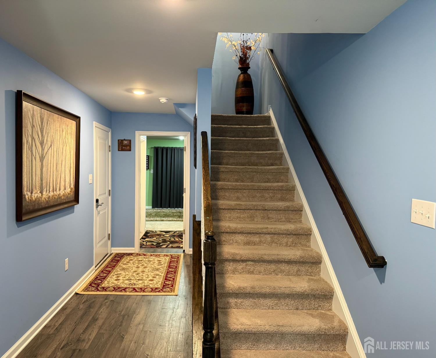 301 Matutina Road Monroe Township, NJ 08831 - Photo 5 of 42 a view of entryway and hall with wooden floor