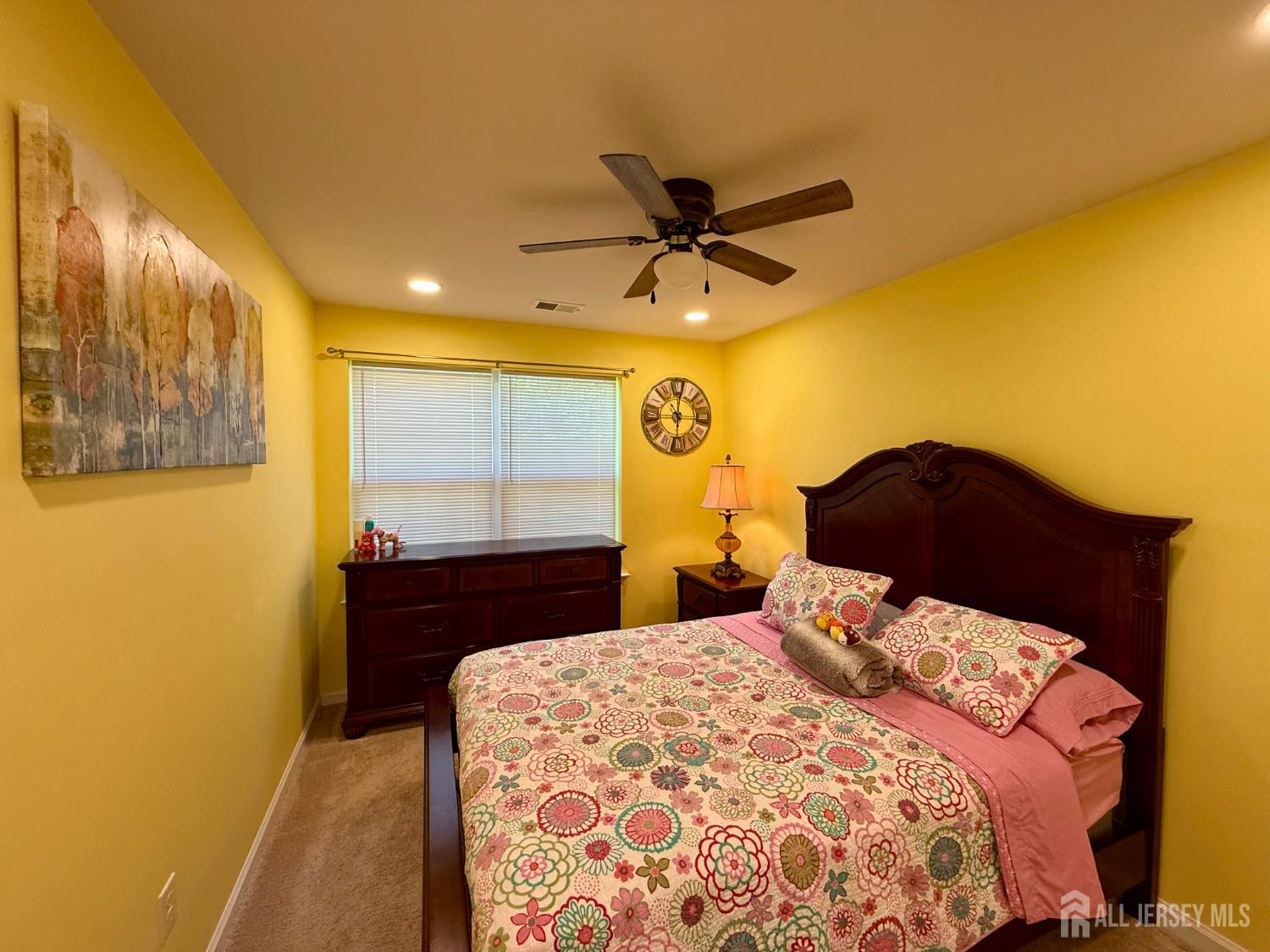 301 Matutina Road Monroe Township, NJ 08831 - Photo 9 of 42 a bedroom with a bed and a window