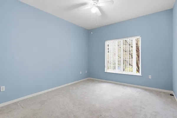 a kitchen with a sink a stove and cabinets