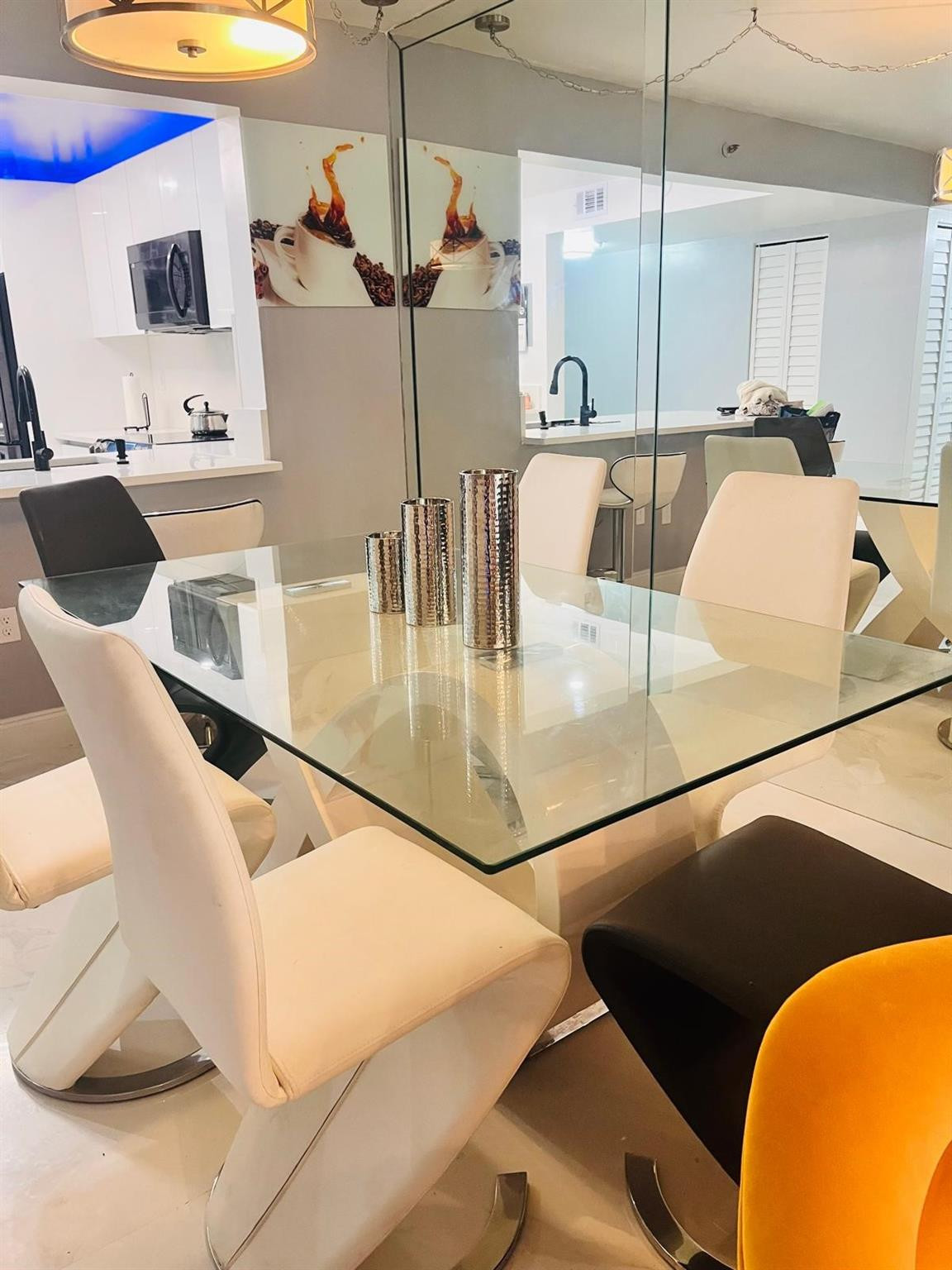 3910 Inverrary Boulevard, Unit 203B Lauderhill, FL 33319 - Photo 18 of 61 a kitchen with stainless steel appliances granite countertop a sink a stove and a refrigerator