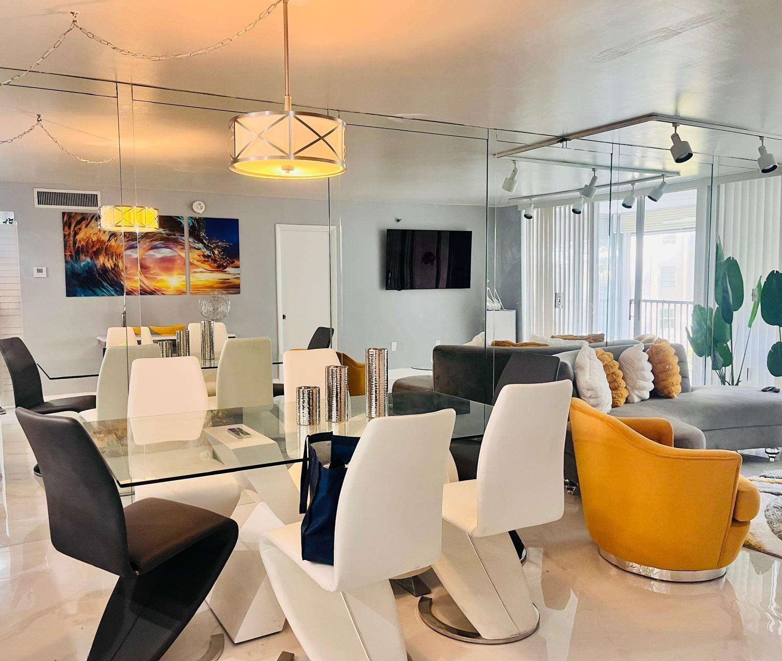 3910 Inverrary Boulevard, Unit 203B Lauderhill, FL 33319 - Photo 19 of 61 a living room with furniture and a flat screen tv