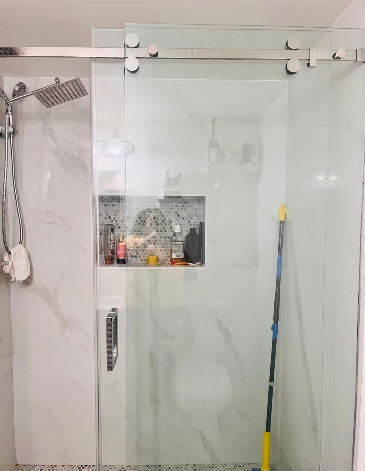 3910 Inverrary Boulevard, Unit 203B Lauderhill, FL 33319 - Photo 34 of 61 a bathroom with a shower