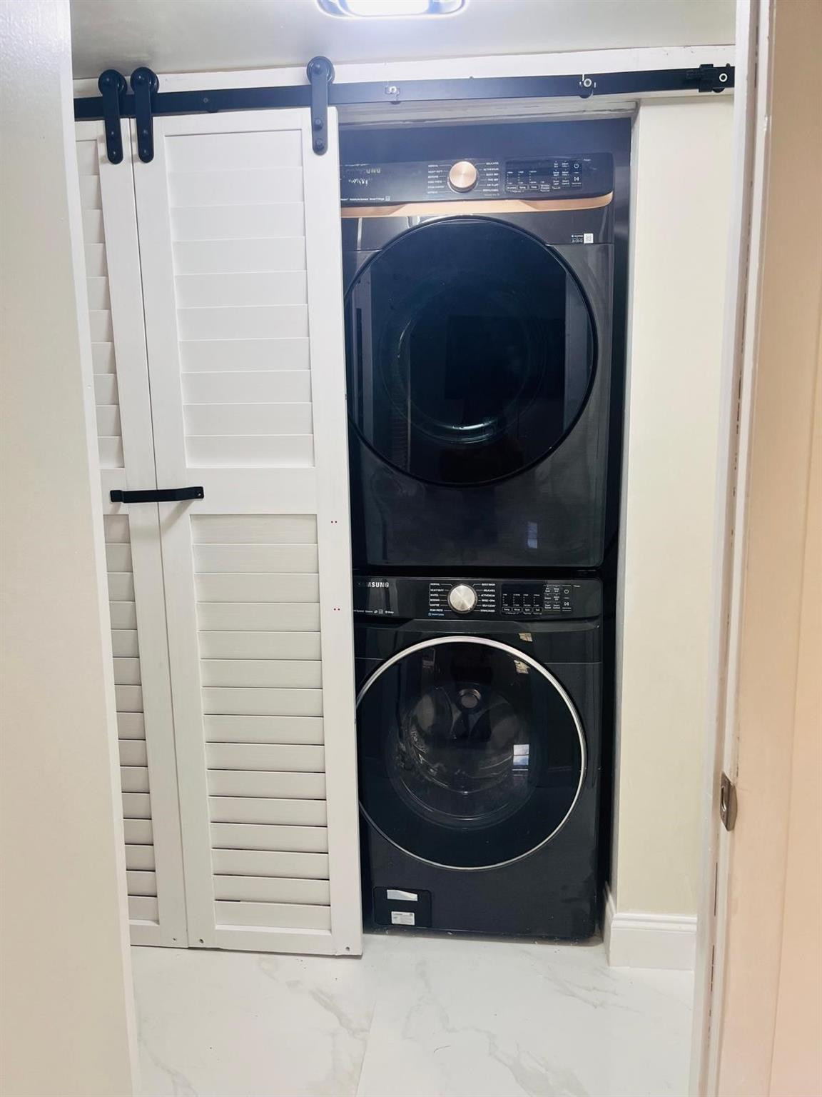 3910 Inverrary Boulevard, Unit 203B Lauderhill, FL 33319 - Photo 42 of 61 a close up view of a washer and dryer
