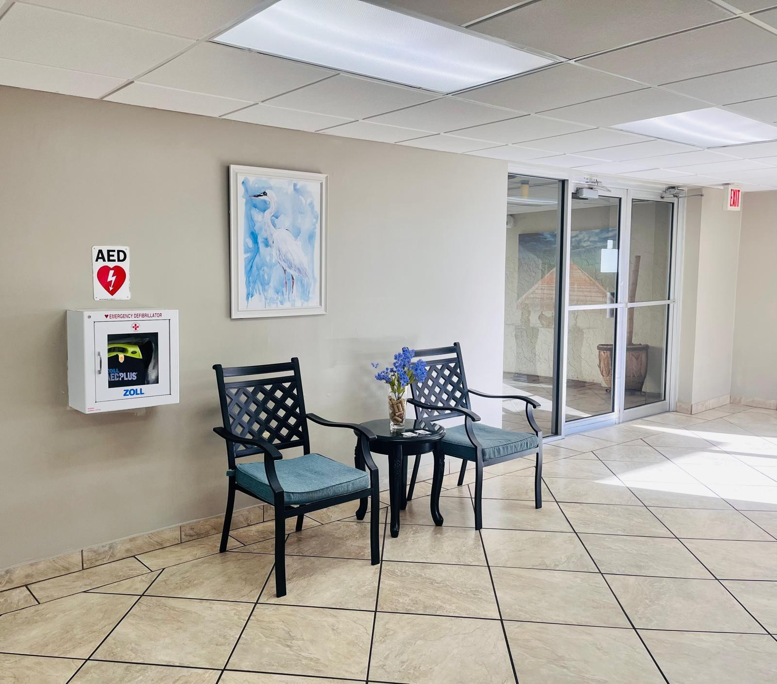 3910 Inverrary Boulevard, Unit 203B Lauderhill, FL 33319 - Photo 51 of 61 a view of a livingroom with furniture and dinning table