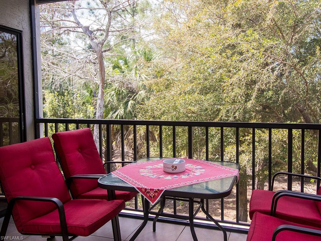 3321 Olympic Drive, Unit 623 Naples, FL 34105 - Photo 17 of 20 a view of a balcony with furniture