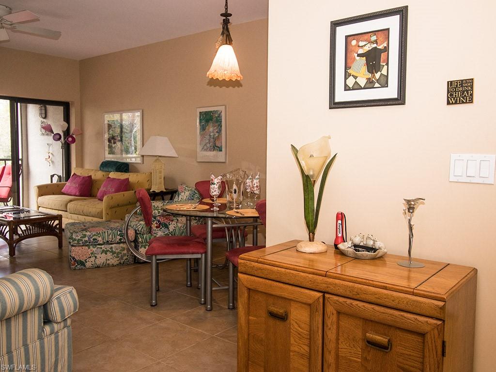 3321 Olympic Drive, Unit 623 Naples, FL 34105 - Photo 6 of 20 a room with furniture and window