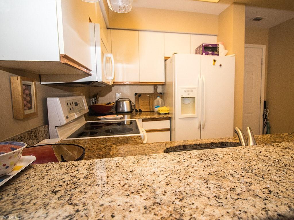 3321 Olympic Drive, Unit 623 Naples, FL 34105 - Photo 9 of 20 a view of a very nice looking room