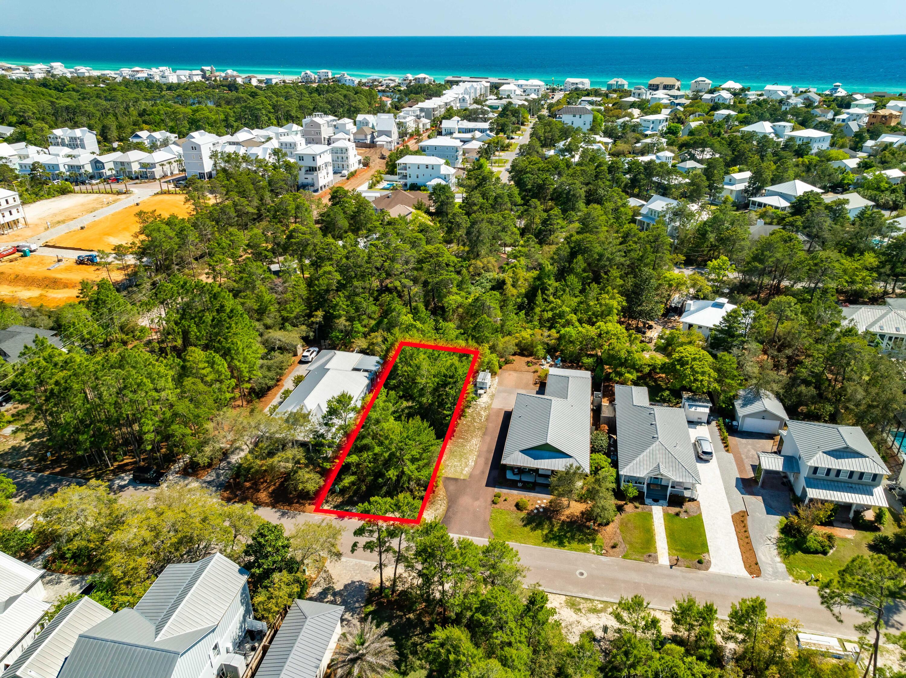 Lot 8 Spotted Dolphin Road Santa Rosa Beach, FL 32459 - Photo 3 of 13 an aerial view of residential houses with outdoor space and swimming pool