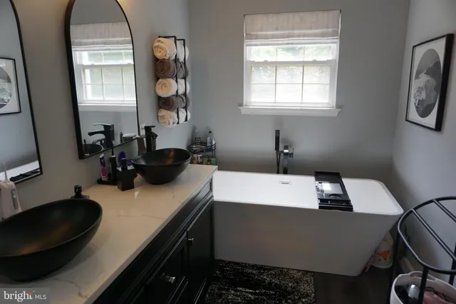 a bathroom with a shower and toilet