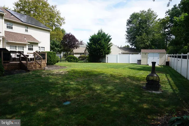 a view of a yard in front of a house