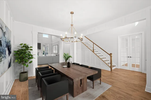 a view of an entryway with wooden floor