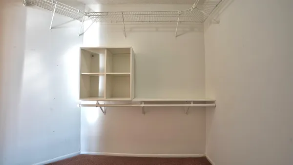 a view of a room with racks on the wall