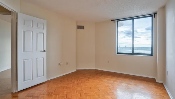 an empty room with windows