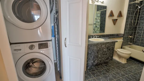 a bathroom with a toilet and a sink