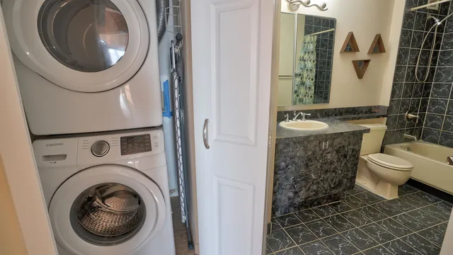 a bathroom with a toilet and a sink