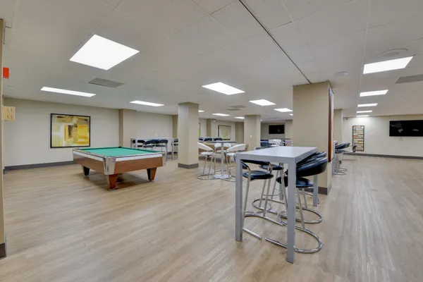 a room with furniture and a wooden floor