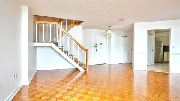 a view of interior and hall with wooden floor