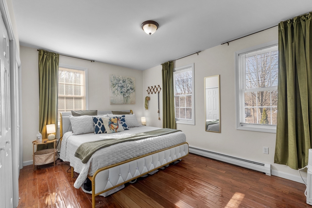 38 Brook Street Georgetown, MA 01833 - Photo 20 of 42 a bedroom with a bed and a window