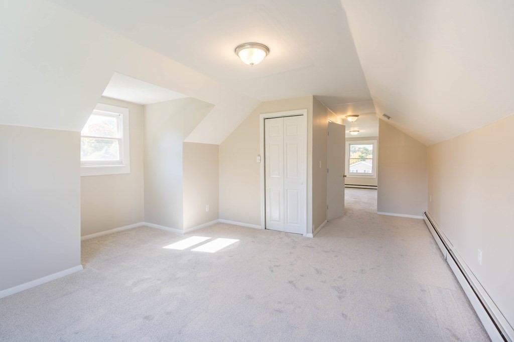 6 Meadowbrook Lane Spencer, MA 01562 - Photo 20 of 39 an empty room with windows and closet