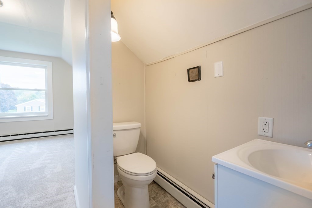6 Meadowbrook Lane Spencer, MA 01562 - Photo 23 of 39 a bathroom with a sink a toilet and shower