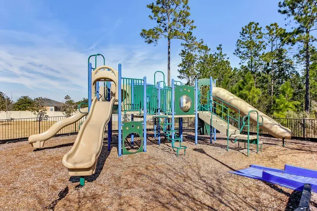 a view of a park with slide