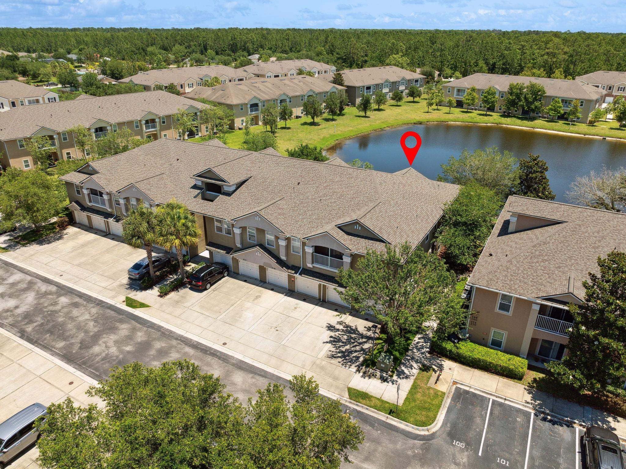 404 Golden Lake Loop St. Augustine, FL 32084 - Photo 32 of 38 an aerial view of a house with a lake view