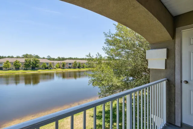 a view of a lake from a balcony