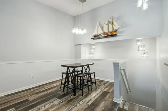 a view of dining room and wooden floor