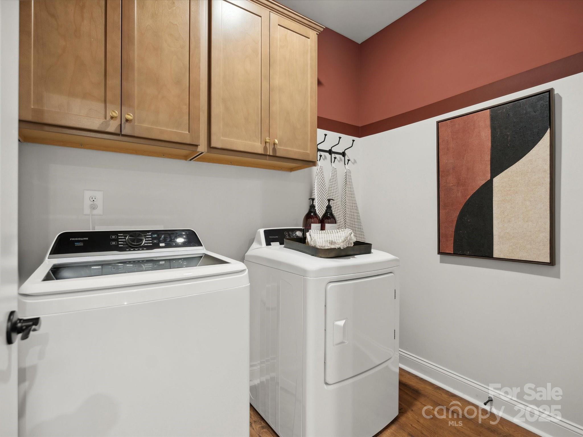 5061 Puddle Pond Road Indian Trail, NC 28079 - Photo 16 of 25 a utility room with dryer and washer