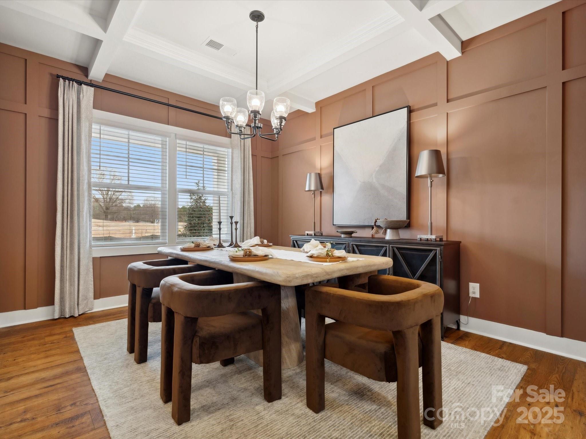 5061 Puddle Pond Road Indian Trail, NC 28079 - Photo 2 of 25 a view of a dining room with furniture window and wooden floor