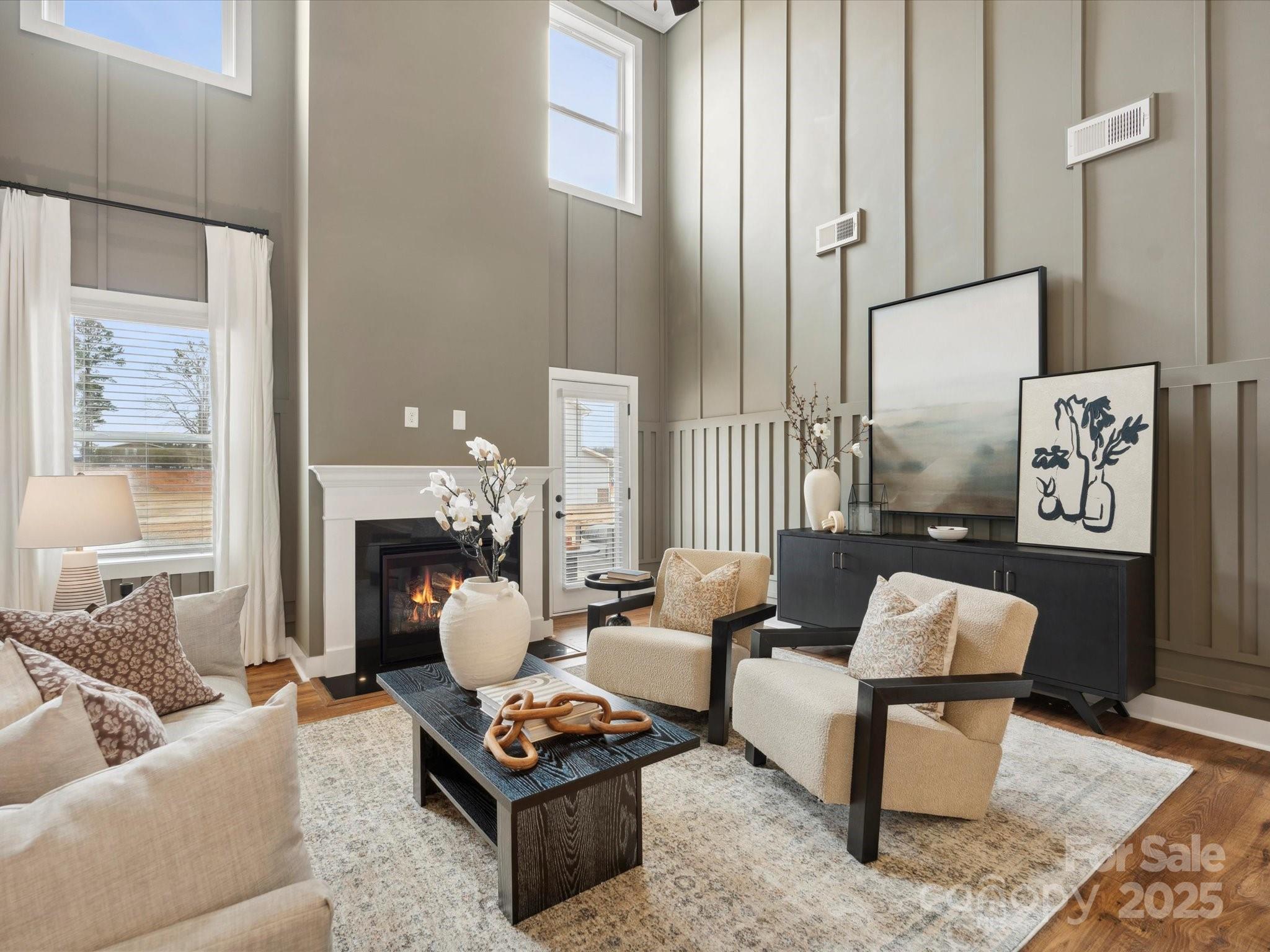 5061 Puddle Pond Road Indian Trail, NC 28079 - Photo 7 of 25 a living room with furniture and a fireplace