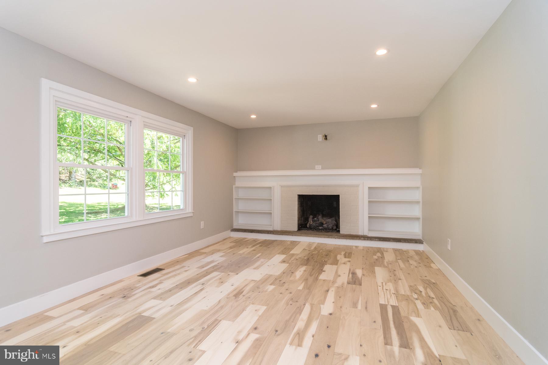 3697 Robin Road Furlong, PA 18925 - Photo 17 of 44 Built-in shelves and gas fireplace
