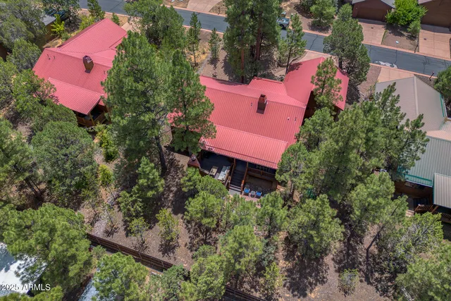 a balcony with furniture and wooden floor