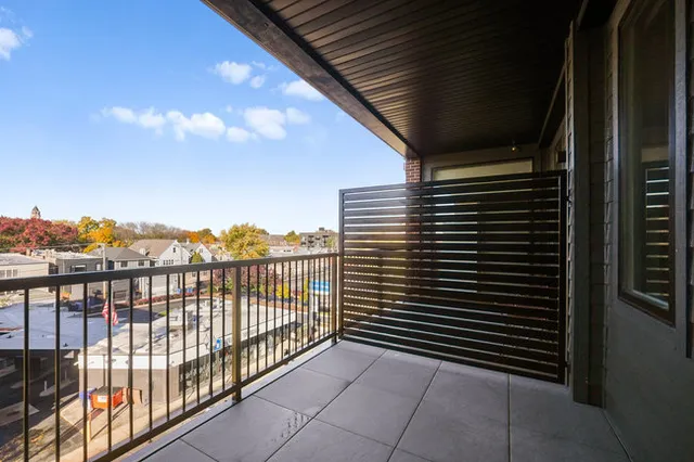 a lobby with furniture and a table