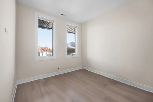 an empty room with windows