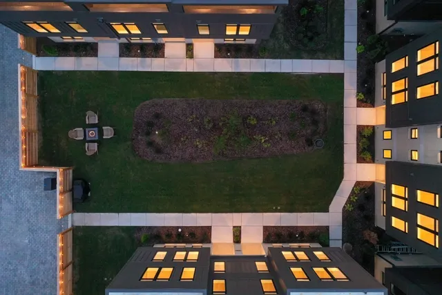 a view of patio with a table and chairs