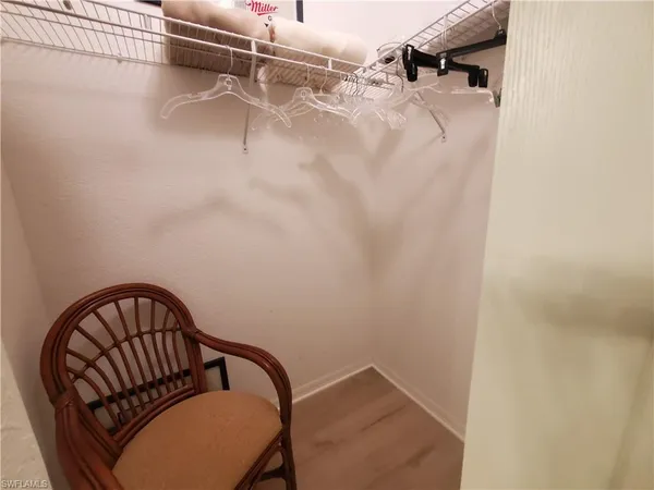 a view of staircase with white walls