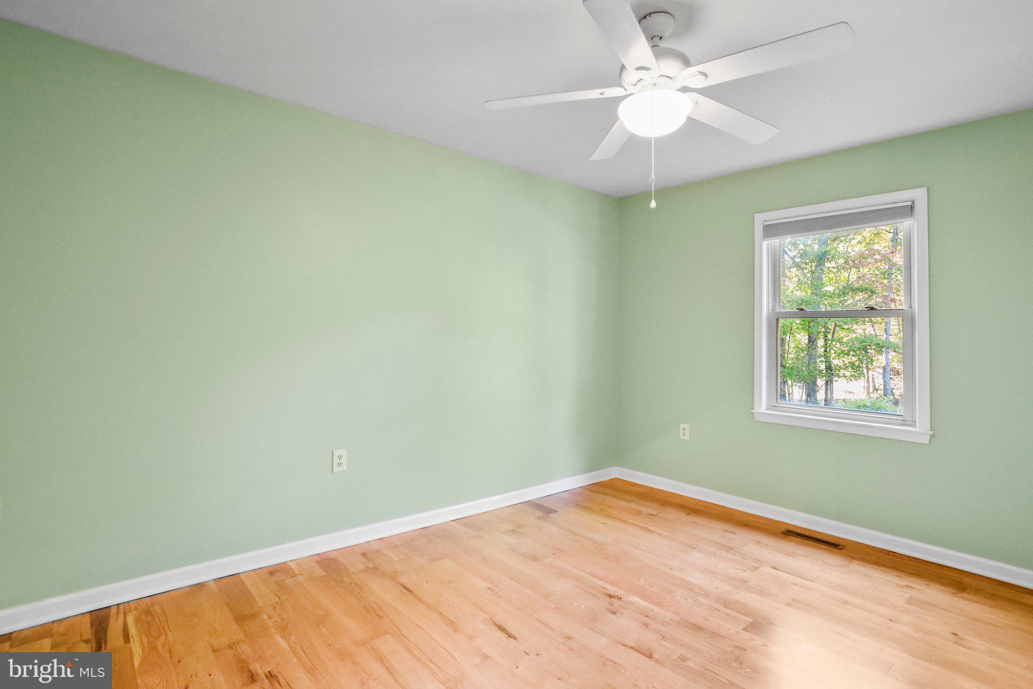 139 Nazareth Drive Fort Valley, VA 22652 - Photo 16 of 31 Main floor Bedroom 2 front woods view