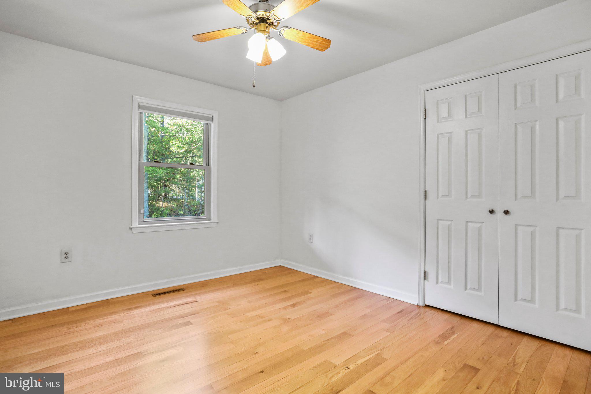 139 Nazareth Drive Fort Valley, VA 22652 - Photo 21 of 31 Main floor Bedroom 5 front woods view
