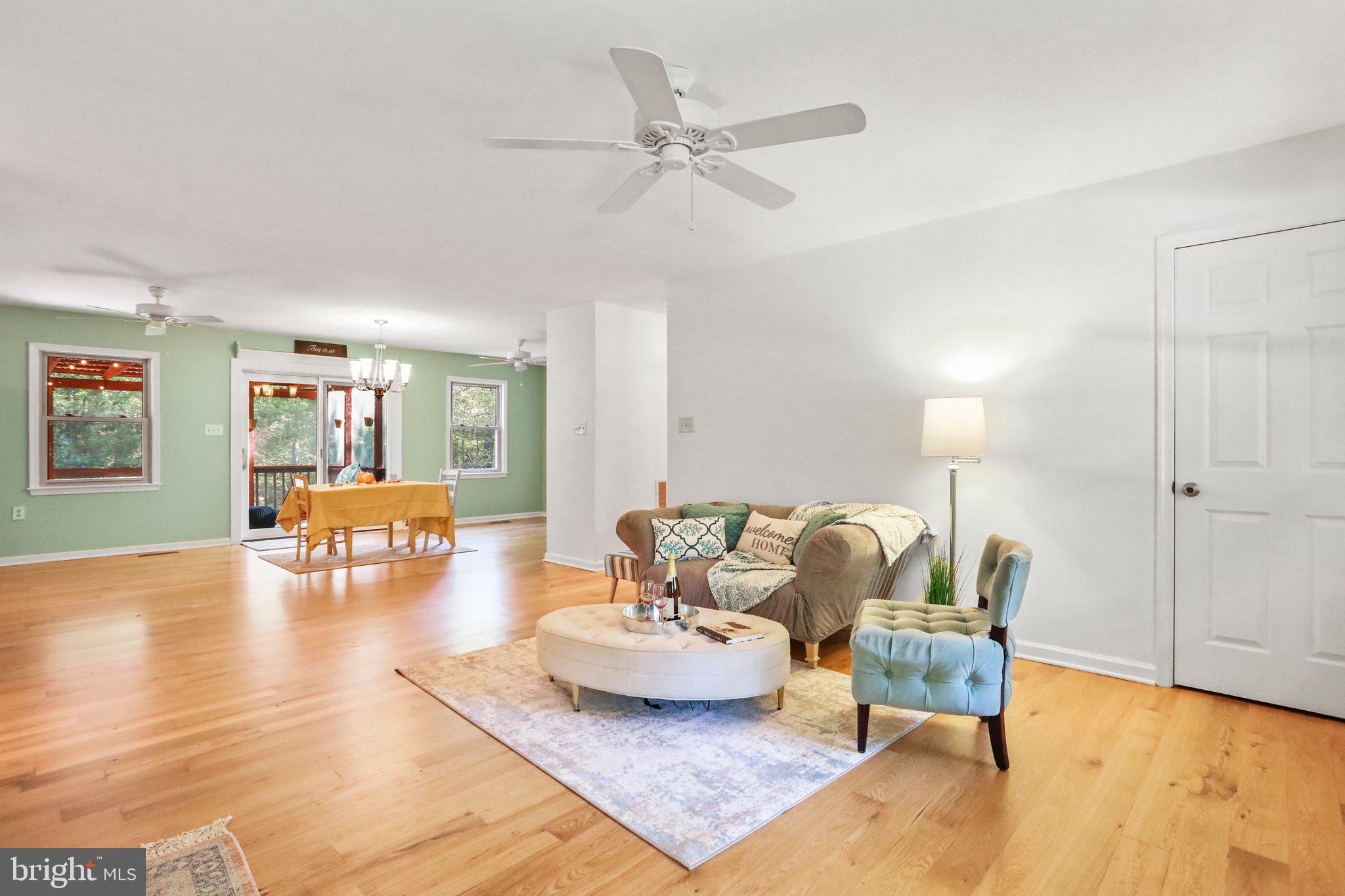 139 Nazareth Drive Fort Valley, VA 22652 - Photo 3 of 31 Open dining area to living room & porch