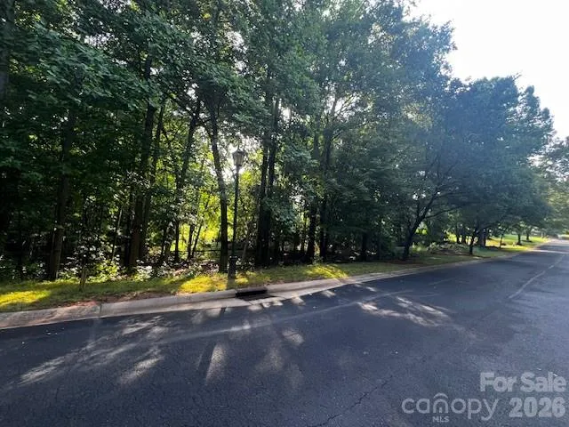 a view of yard with yellow and trees