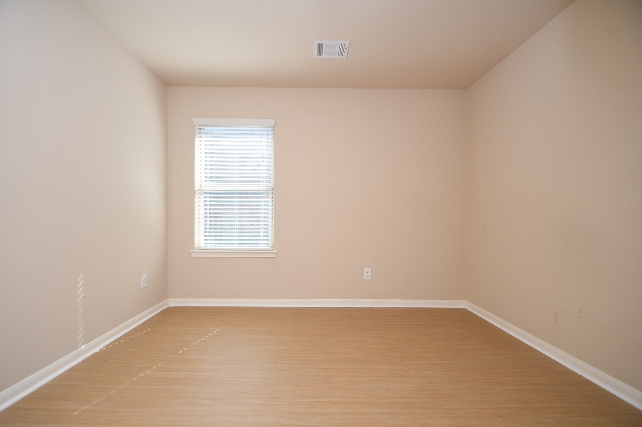 10015 Bitternut Hickory Lane Tomball, TX 77375 - Photo 28 of 36 an empty room with a window