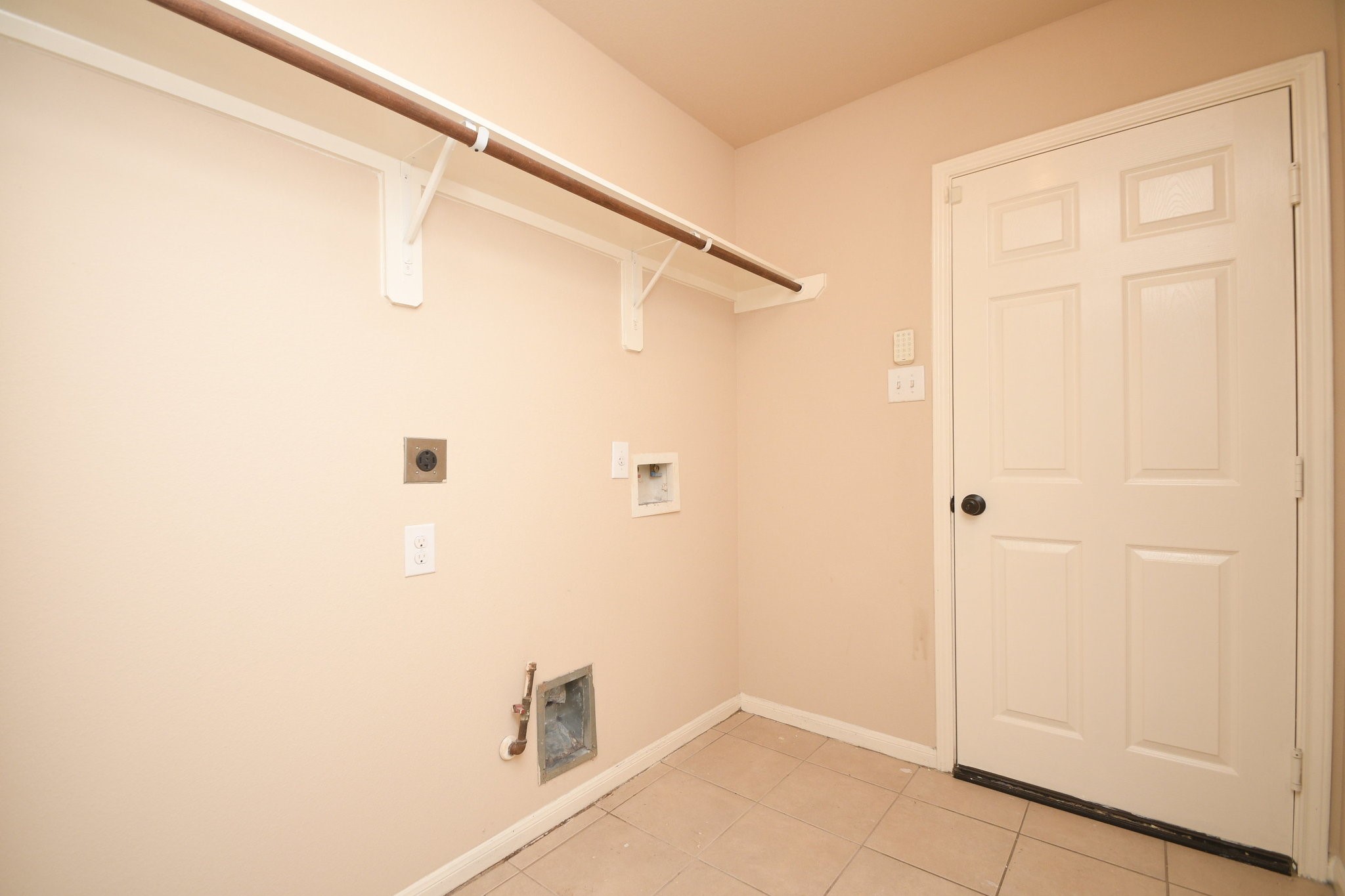 10015 Bitternut Hickory Lane Tomball, TX 77375 - Photo 31 of 36 a bathroom with a shower and a window