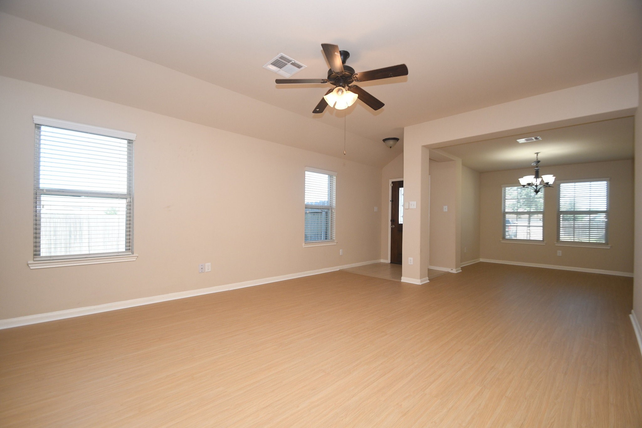 10015 Bitternut Hickory Lane Tomball, TX 77375 - Photo 7 of 36 a view of an empty room with a window
