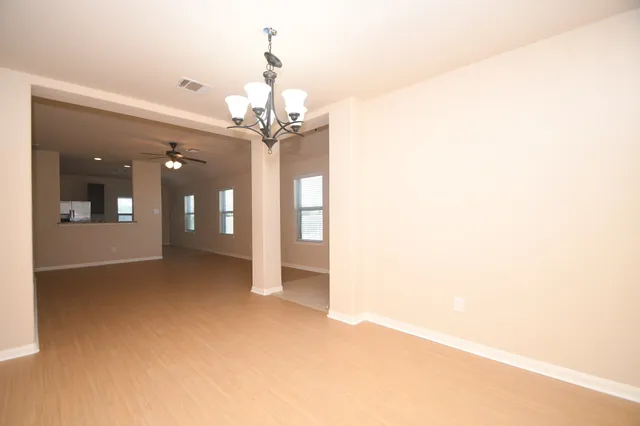 a view of a chandelier in a big room