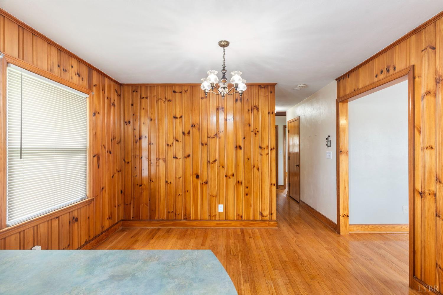 2920 Goode Station Road Goode, VA 24556 - Photo 8 of 50 a view of a room with wooden floor and windows