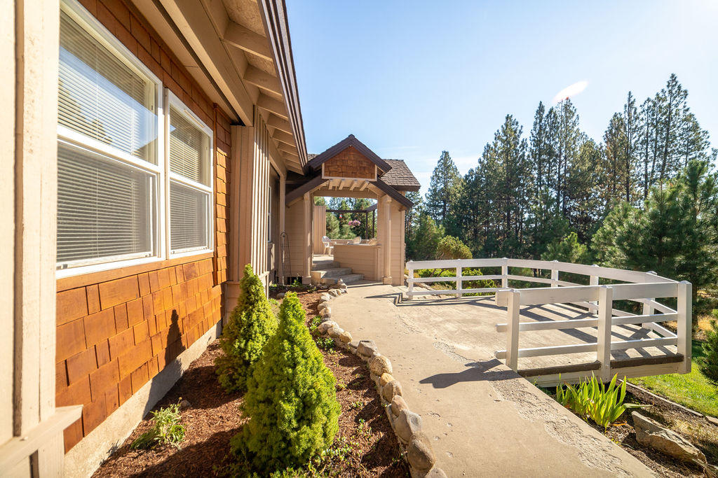 19132 Pumice Butte Road Bend, OR 97702 - Photo 2 of 49 a view of a house with backyard and sitting area