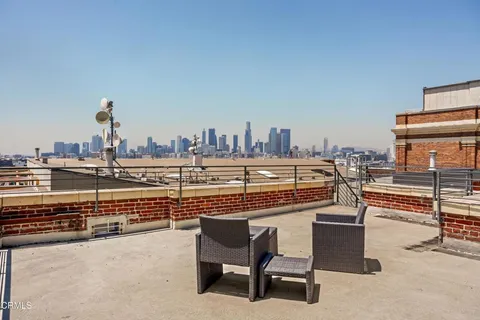 a terrace with a city view
