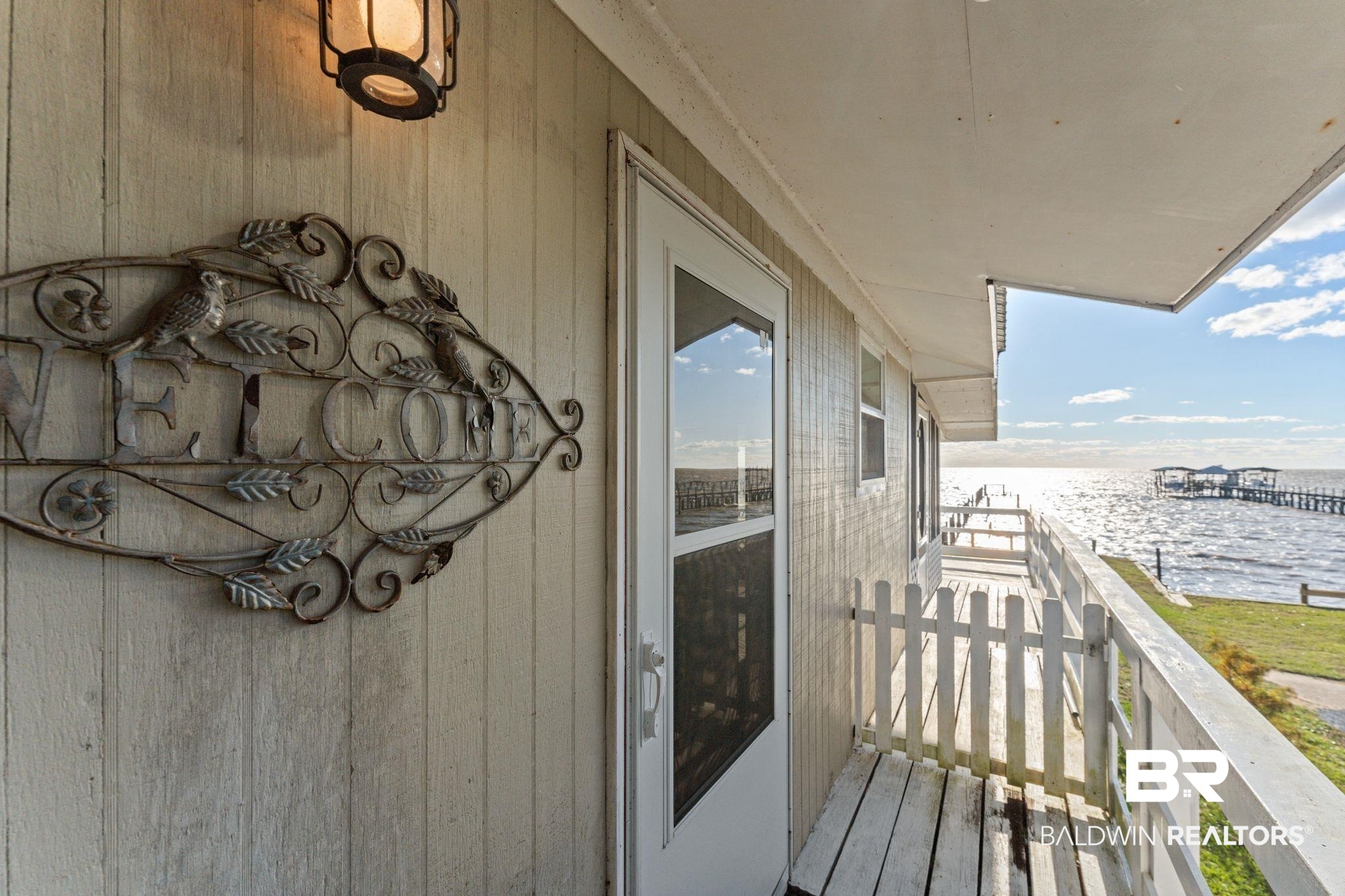8959 Shore Drive Foley, AL 36535 - Photo 10 of 53 Balcony with a water view