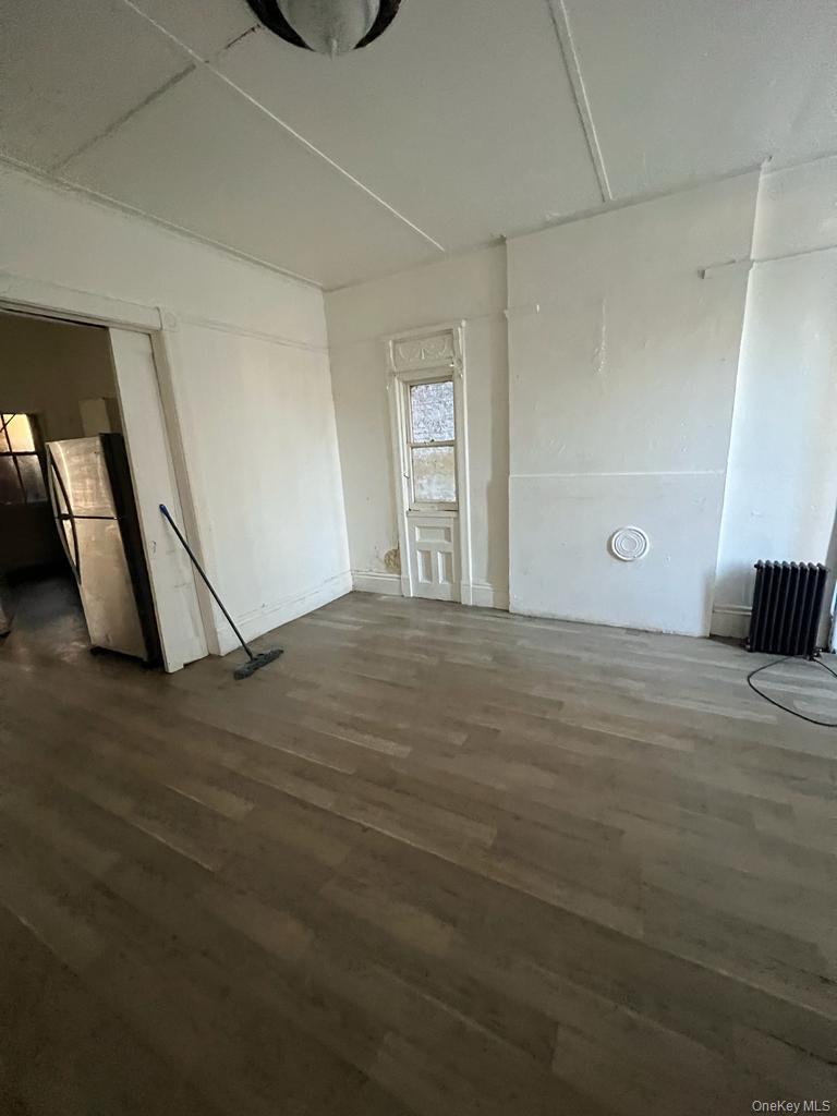 119 Chambers Street Newburgh, NY 12550 - Photo 11 of 18 a view of empty room with wooden floor